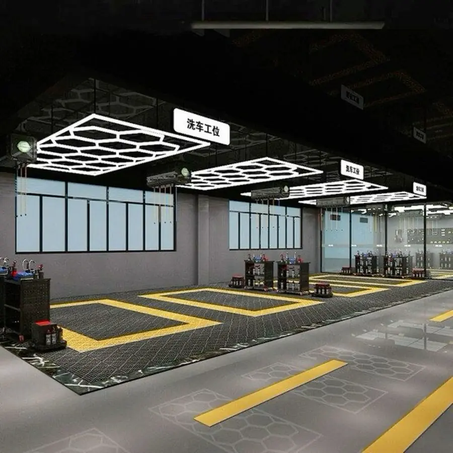Lavado de chasis: Taller de detallado con luces led y piso limpio